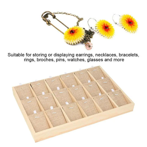 Hella Durable Pine Wood Jewelry Tray With Eighteen Secure Slots For Countertop Display Storage showcasing earrings and necklaces on a burlap-lined tray.