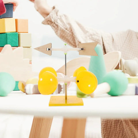 Weather Vane Educational Kit With Wind Indicator for Classroom Science Projects displayed on a table with blocks.