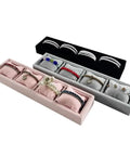 Premium Velvet Jewelry Watch Tray Organizer Featuring Four Spacious Grids And Soft Memory Foam Inserts For Secure Bracelet Storage and display with pink and black trays.