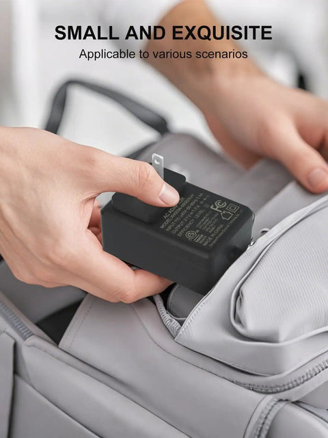 21V 1A Mini Chainsaw Battery Charger placed in backpack pocket, showcasing portability for Saker Seyvum Aker O Conn Mini Chainsaws.