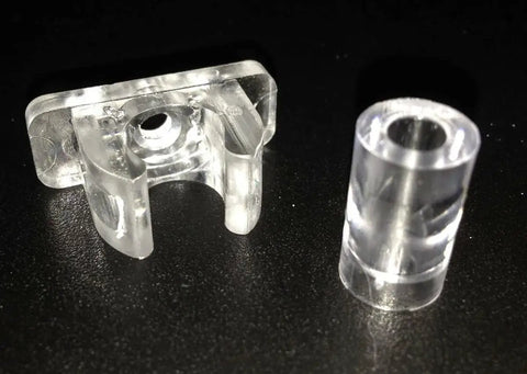 Close-up of transparent piece from False Front Cabinet Clips With Screws Kit For Kitchen Cabinets And Drawer Fronts 10 Pairs Reinforced
