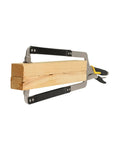 Heavy Duty 22 Inch Locking C Clamp With Swivel Pads For Woodworking And Welding Projects One Hand Operation Easy Release And Secure Soft Rubber Grip Durable Alloy Steel Construction For Long Lasting Use on wood beam