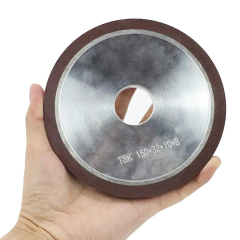 Badass 6 Inch Diamond Grinding Wheel 150 Grit Resin Bonded Flat Profile Tool For Carbide Metal And Tungsten Steel Sharpening 75 Percent Concentration Heavy Duty Workhorse Grinder, 150 grit tool held in hand.