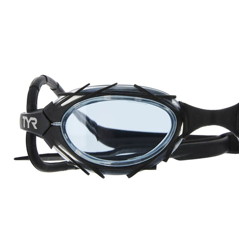 Crush The Daily Lap Grind With These Nest Frame Swim Goggles Locked In With Smoke Tint Wide Peripheral Vision And Tough Unibody Construction For Peak Pool Visibility. Side view of polycarbonate swimming goggles with smoke tint lenses.