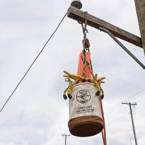 Heavy Duty Canvas Bucket With Leather Bottom, 12 Inch Diameter, 1 Pocket, 100 Pound Load Rated Utility Bucket hanging on pole