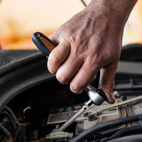 Using 107 Piece Workhorse Allen and Torx Socket Set With Hex Ball End Bits in auto DIY project, close-up on hand and tool application.