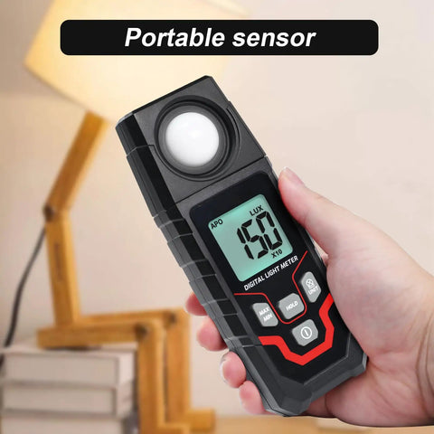 High Accuracy Handheld Light Meter With Lux And FC Switchable Units Measures 0.1 To 200000 Lux And 0.01 To 20000 FC LCD Backlit Display Ideal For Indoor Outdoor Film Photography And Lighting Setup. handheld black ABS meter in hand, front view