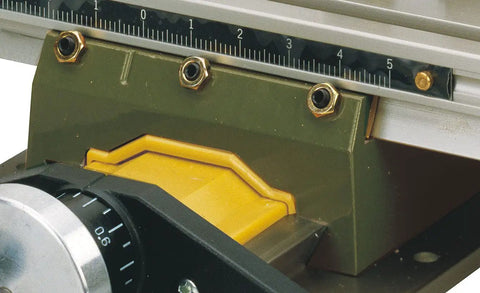 Close-up of Micro Compound Table KT 70 with adjustable ruler for precise alignment on drill stands and drill presses.