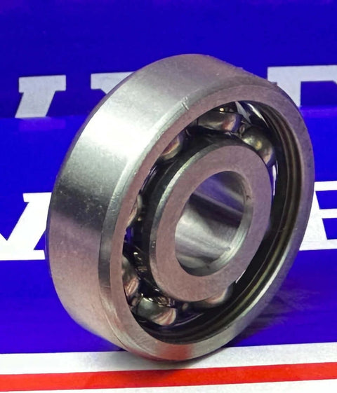 6200 Bearing 10x30x9mm Open chrome steel side view on colorful background