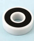 6901-2RS ZrO2/Si3n4 Full Ceramic Bearing PTFE based Grease with white and black design, close-up view.