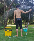 Person using Compact Portable Pressure Washer With 5 Gallon Tank And 255 Psi For Easy Car Washes Pet Bath Home And Patio Cleaning Plus A Camper Friendly 45 Minute Runtime For Off Grid Adventures outdoors