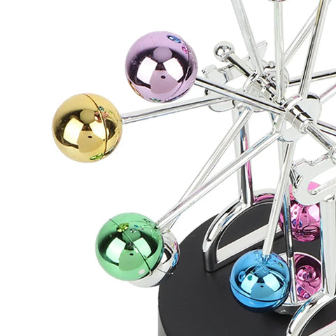 Close-up of colorful balls on Dope Electric Newton Pendulum Ball Desktop Decor Battery Powered Kinetic Science Toy For Your Desk Colorful Design