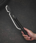 Person holding Pro Grade Cassette Removal Tool Kit for Shimano and Sram Freewheel Turner, Chain Whip, extra long handle