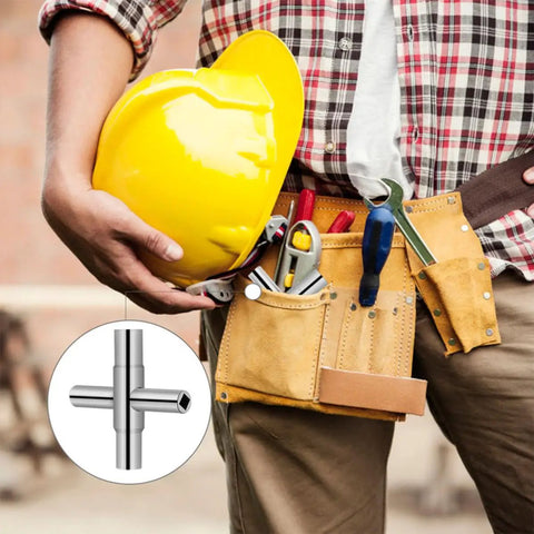 Person holding a yellow hard hat with a tool belt featuring Heavy Duty 4 Way Socket Wrench And Water Valve Key Set Handles Outdoor Faucet Nuts For Quick Yard Fixes Dead Simple To Grip Works Like A Dream On Daily Hardware Projects.