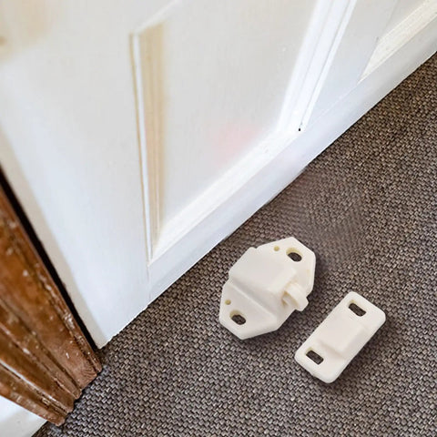 Five Pack Door Roller Catch Set With Spring Loaded Strike In White ABS For Cabinets And Closets, on carpet near door