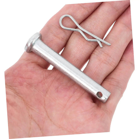 Close-up of scaffolding coupling pins and locking retainers, durable steel construction for fast, easy scaffold assembly.