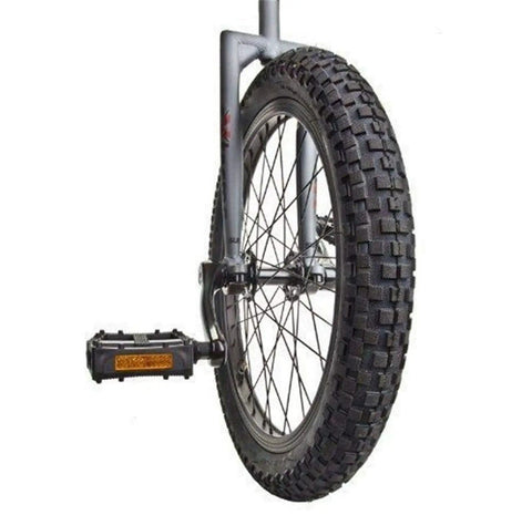 Close-up of wheel, tire, and pedal of Flat Top Extreme Unicycle For Tough Trails And Street Stunts With Rugged High-Tensile Steel Frame