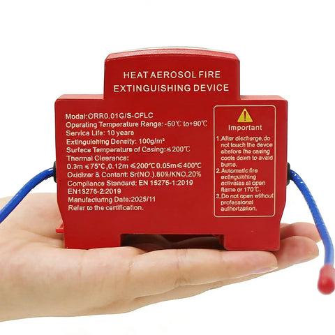 Automatic Din Rail Fire Extinguisher With Dual Nozzle Heads And Smart Heat Trigger For Electrical Panels, compact red device in hand.