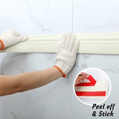 Installing Peel And Stick Baseboard Trim With Self Adhesive Chair Rail Molding Made From Hardened Rubber on wall