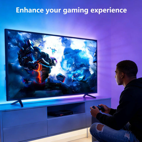 Person playing video game with TV Backlight Kit With Remote, Bluetooth App Control, 4096 DIY Colors, 32 To 58 Inch LED Strip