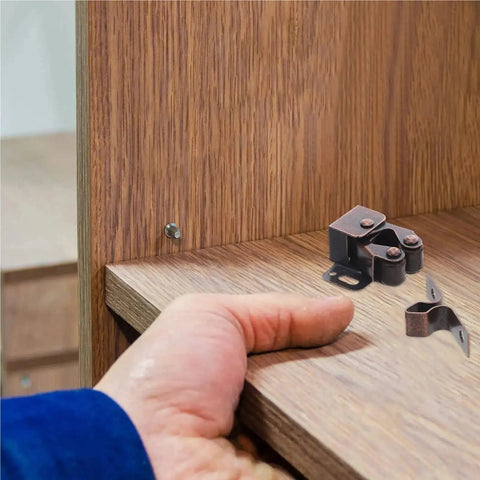 Cabinet installation with Double Roller Cabinet Door Catch Set Of 12 With Soft Cushion Spring Loaded Ball Latches on wooden surface.