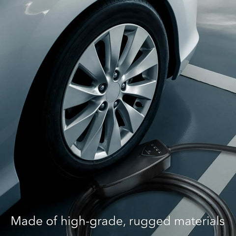 Level 2 Electric Vehicle Charger 40 Amp 240 Volt NEMA 14 50 Plug 16 Ft Cable next to a car wheel in a parking spot.