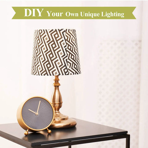 DIY Lamp Wiring Kit With 8 Inch Silver Harp beside a clock on table, showcasing custom lighting design with patterned shade.