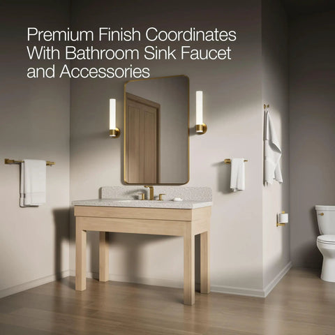 Bathroom with modern fixtures including a sink, mirror, and accessories. Cimarron Left-Hand Trip Lever For Comfort Height Toilets not visible.
