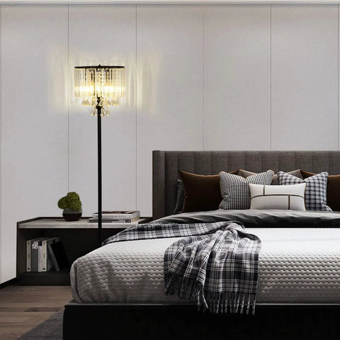 Crystal Floor Lamp With Foot Pedal Dope Modern Standing Light for bedroom with black tall pole and 3-light fixture.