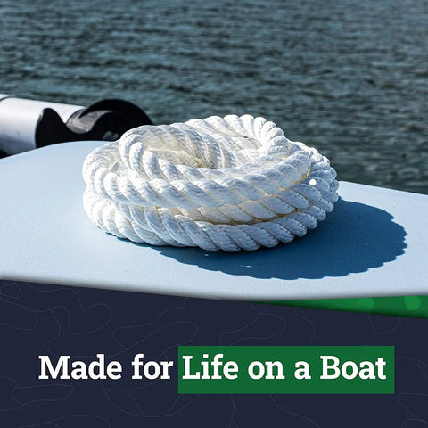 Heavy Duty Twisted Nylon Rope For Indoor And Outdoor Use All Purpose Utility Cord With Medium Stretch Do It All For Towing Dock Lines Camping Crafts And Survival Gear 2 Inch By 25 Foot White coiled on boat deck