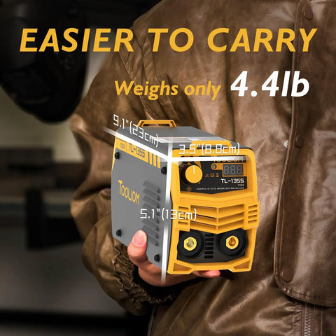 Person holding 135 Amp 110V Mini MMA Arc Welder With Digital Display DC Inverter Portable Workhorse 2 In 1 Stick And Lift TIG Ready Welder