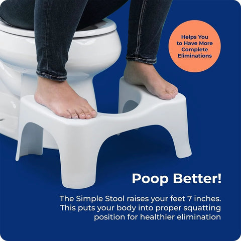 White Squatty Potty Simple Curve 7-inch bathroom toilet stool with feet on it beside a toilet