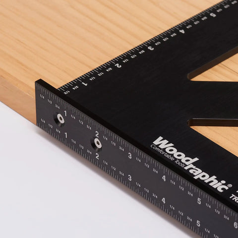 Close-up of Pro Grade 12 Inch Carpenters Square CNC Aluminum Right Angle Layout and Marking Tool for Framing on wood surface