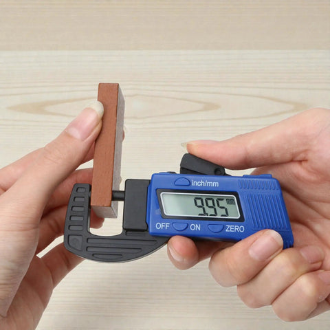 Digital Thickness Gauge Micrometer With Portable Rugged Build And Quick Inch Metric Switching shows measurement of 9.95 mm on wood.