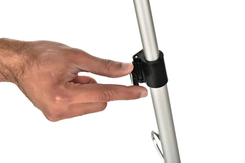 Hand adjusting the locking mechanism on the collapsible handle of the Digital Distance Measuring Wheel with Crisp LCD Readouts.