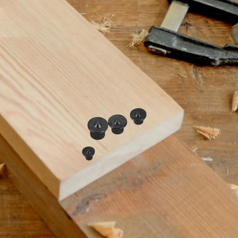 8 Piece Woodworking Dowel Center Pins Kit For Drilling Centering And Tenon Transfer Locating Tool For Furniture Assembly And Woodworking Projects Carbon Steel placed on wooden plank background.