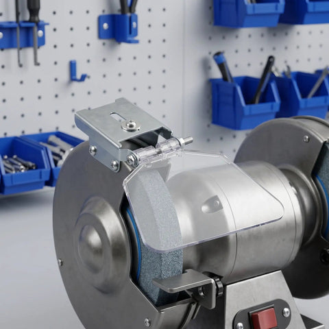 WRITWAA 2-Pack Industrial Bench Grinder Eye Shield Guard on stainless steel grinder, protecting from sparks and chips.