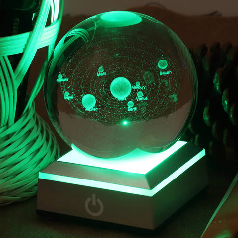 3D crystal planet engraving on rounded LED base with green lighting. Turn Up Display Vibes With This Rounded Led Base Designed For 3D Laser Crystal Engravings Six Quick Color Cycling Modes And A Smooth Gliding Touch Switch That Hits Different.