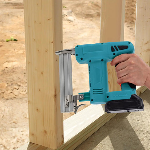 Top Shelf Cordless Brad Nailer 100W Copper Motor Shoots Smooth At 80 Nails Per Minute Rust Resistant Tip in hand near wood