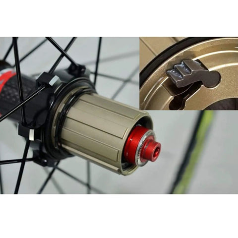 Close-up of 700C Road Wheelset With Front 100mm And Rear 130mm Quick Release Hubs, showing carbon blend hub with sealed bearings.