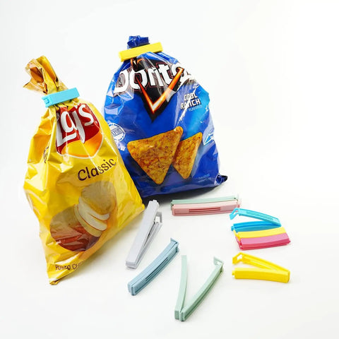 32 Piece Curved Plastic Bag Clips For Kitchen And Home Resealable Food Storage Sealers shown on snacks bags with various colors.