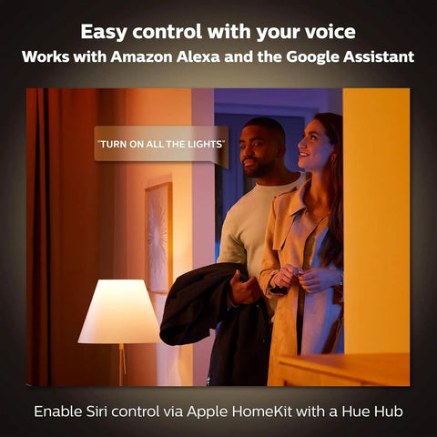 Gold Smart Table Lamp With White And Color Ambiance LED in a living room, showing easy control with Alexa and Google Assistant.