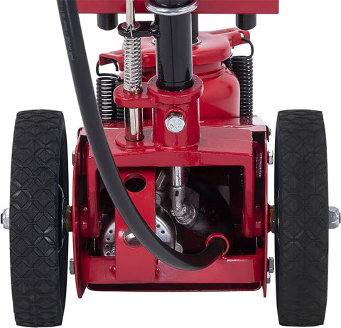 Close-up view of the Knockout 22 Ton Air Hydraulic Axle Jack showing wheels and hydraulic components.