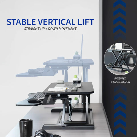 32 Inch Desk Converter K Series Sit To Stand Riser With Dual Monitor And Laptop Workspace Height Adjustable Standing Desk Attachment Wide Keyboard Tray Black DESK V000K showing stable vertical lift feature.