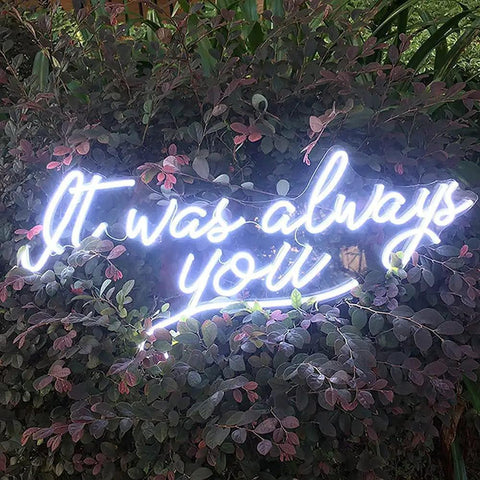 It Was Always You Neon Sign LED Light For Wall Decor And Cozy Room Vibe amidst foliage, dimmable neon art for events