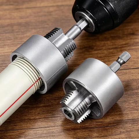 Heavy Duty Internal And External Pipe Threading Tool Kit Cut 1/2 And 3/4 Inch Pipes Electric Drill Compatible Alloy Steel Threader for Plumbing Repairs Durable Tap Wrench close-up of threading tools on PVC pipe.