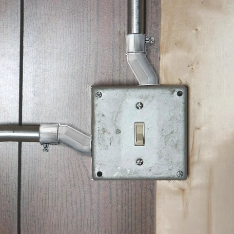 Heavy Duty Zinc Alloy Conduit Adapters With Smart Offset Design For Tricky Tight Spaces Hustle Free Solo Install Slick Half Inch To Half Inch Wire Routing Pack Of Six Killer Tool Set connected to a junction box.