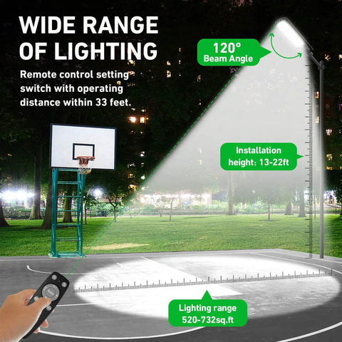 Wide range lighting of powerful solar street light for outdoors with 900 LEDs, 45000 lumen flood lights, and remote control on basketball court.