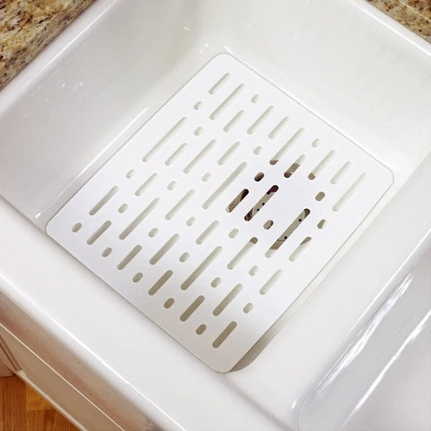 Enhanced Microbal Sink Mat Small White Kitchen Protector Cushions Breakable Dishes Keeps Sink Dry With Raised Feet And Keeps Beneath Space Clean Durable Non Slip Design Prevents Slips While Keeping Items Safe mat in white porcelain sink from above