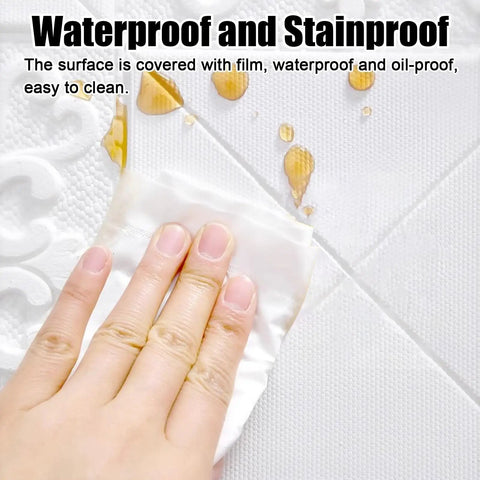 Cleaning the waterproof Top Shelf 3D Peel And Stick Ceiling Tiles 30 Pieces Soft PVC Foam Panels with a cloth.